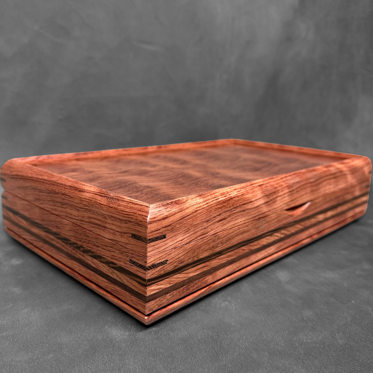 The One — October 2026 · Bubinga with Bubinga Lid Wenge Stripes Valet Box