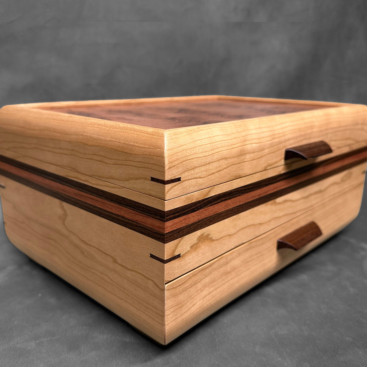 The One — October 2026 · Cherry Sophisticated Chest