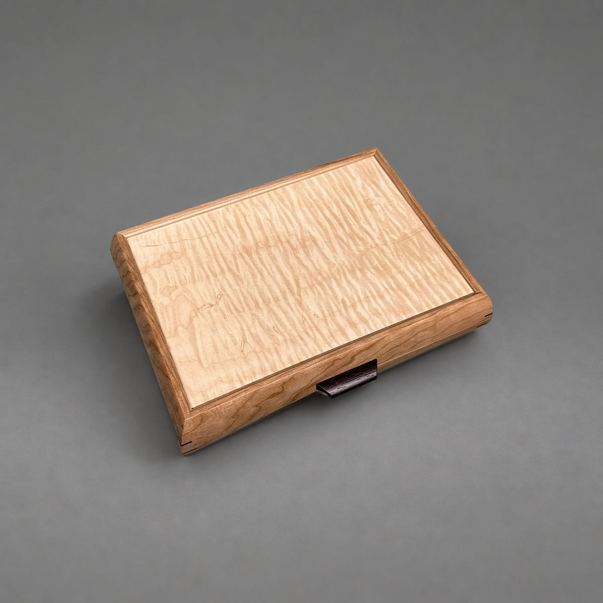 Curly maple lid detail from above