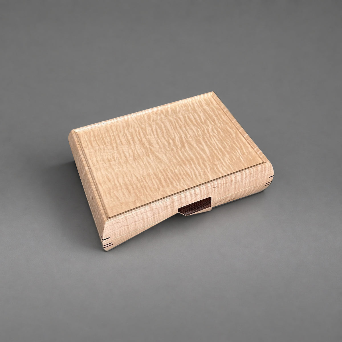 Curly maple lid detail from above