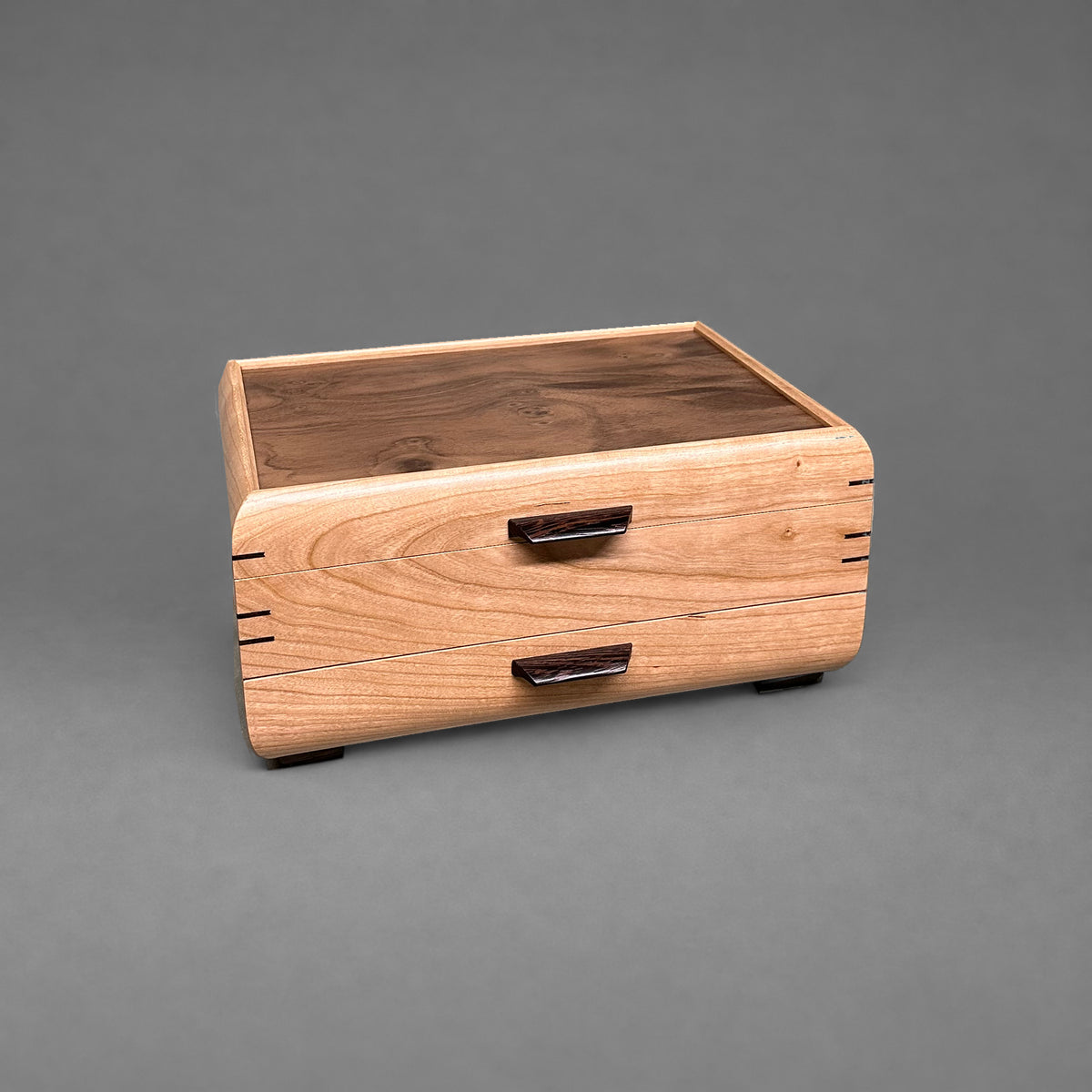 Sophisticated Jewelry Chest cherry with walnut lid, closed