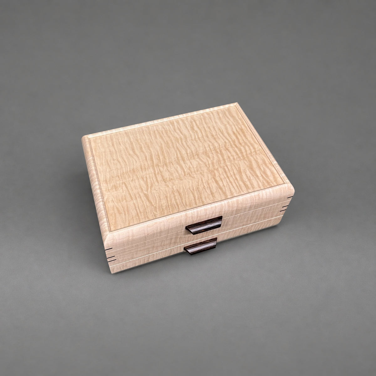 Curly maple lid detail from above