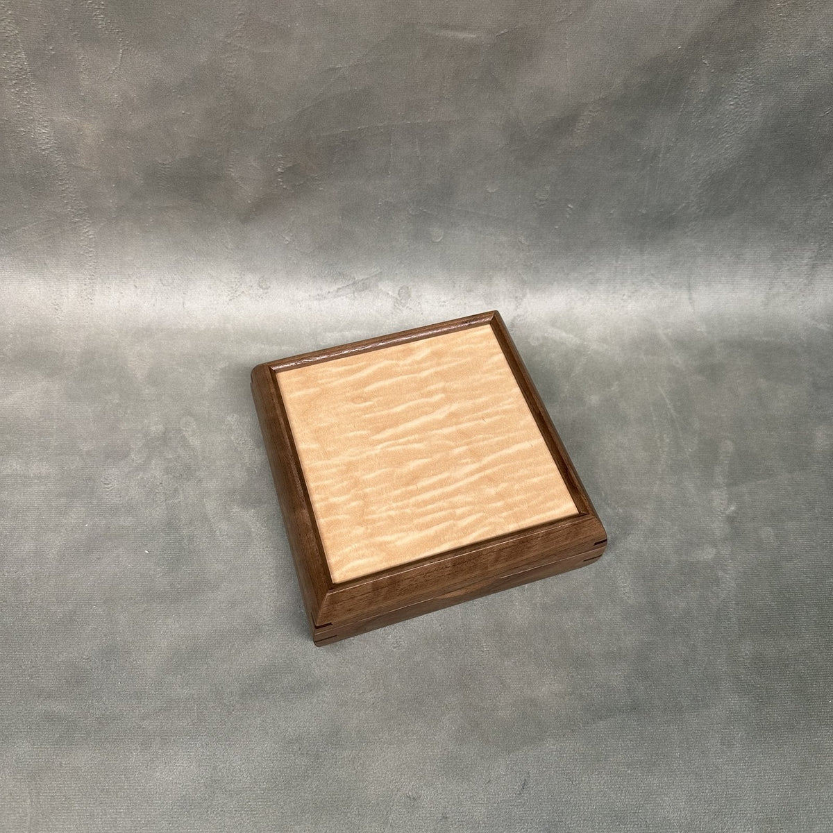 Curly maple lid from above, engraving area