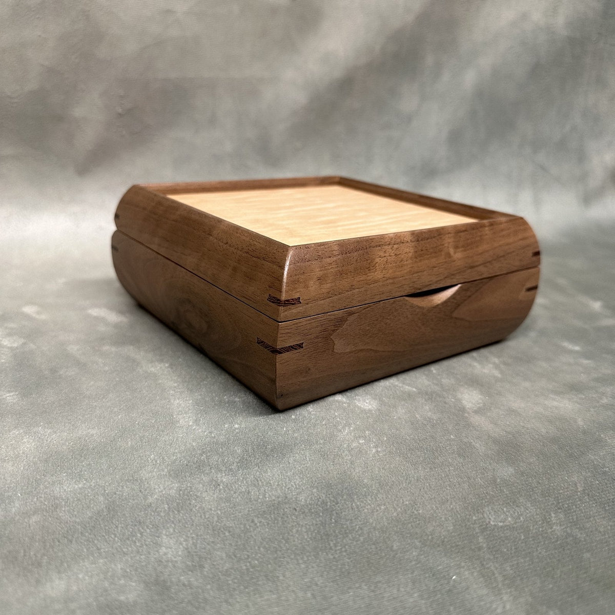 Square Trinket Box walnut with curly maple lid, front detail