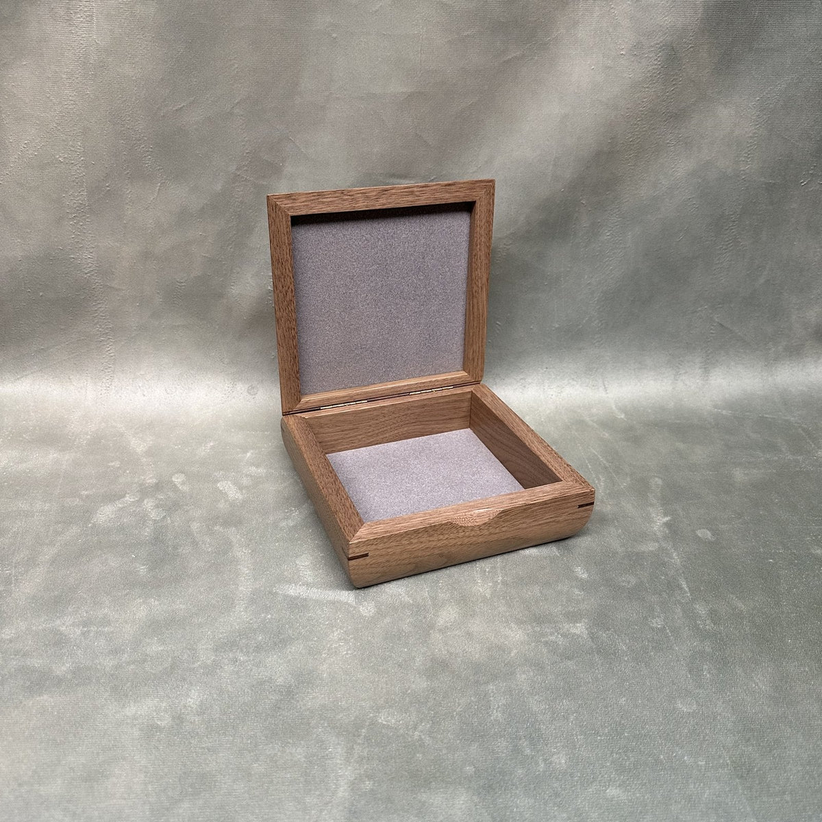 Square Trinket Box in walnut, open showing soft-lined compartment and lined lid