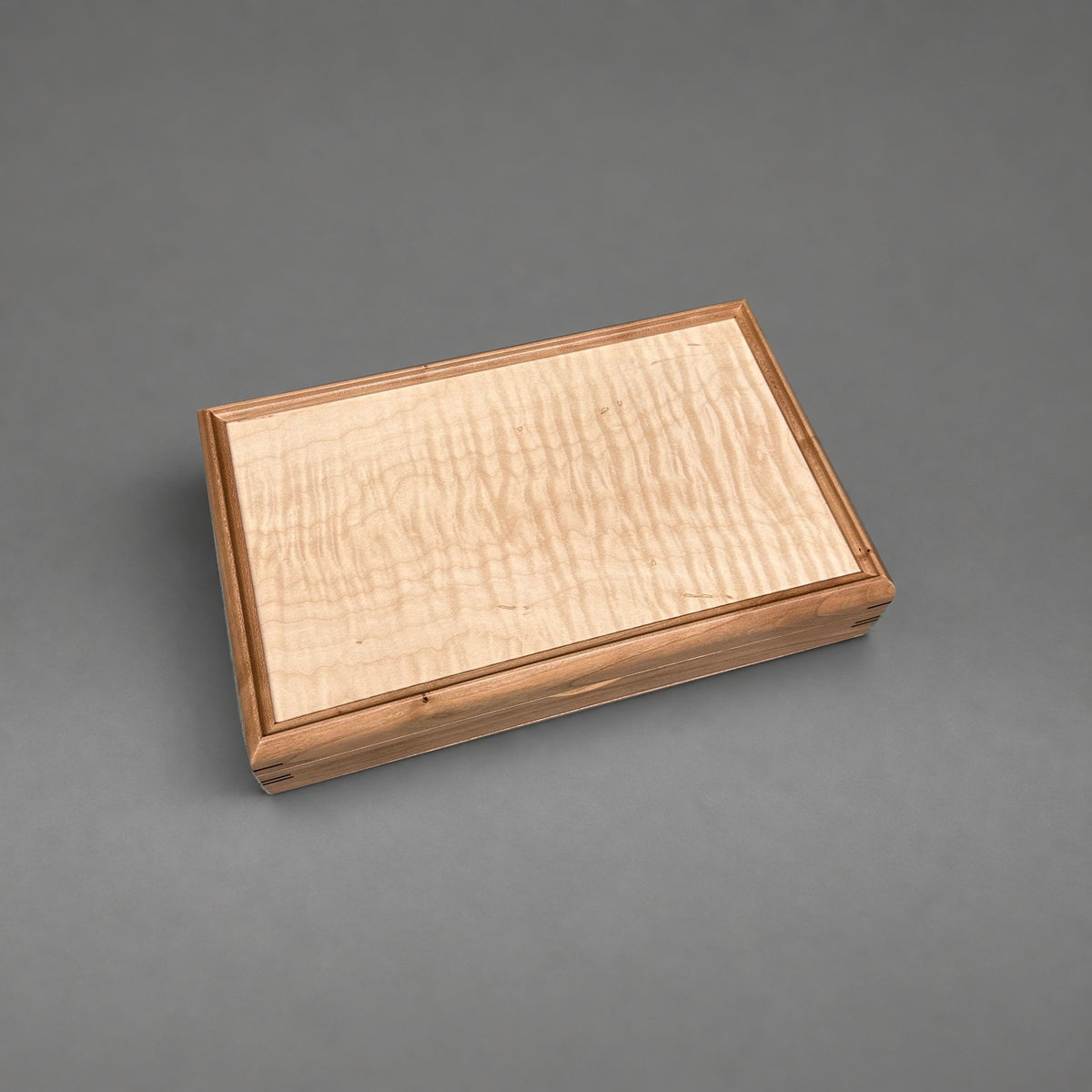 Curly maple lid detail from above