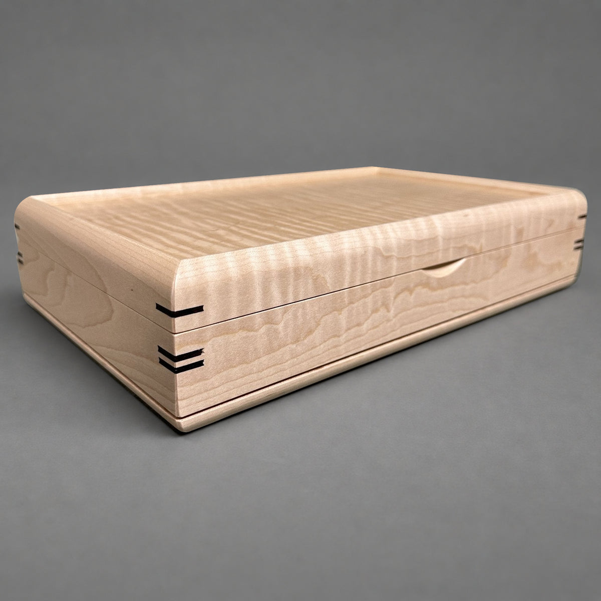 Curly maple lid detail from above