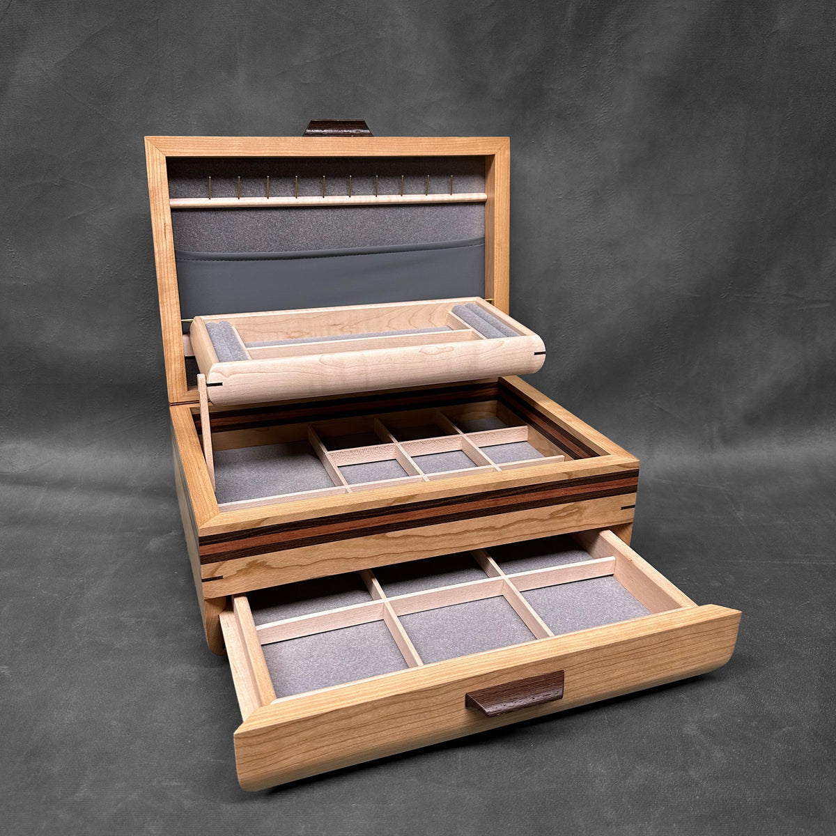The One — October 2026 · Cherry Sophisticated Chest