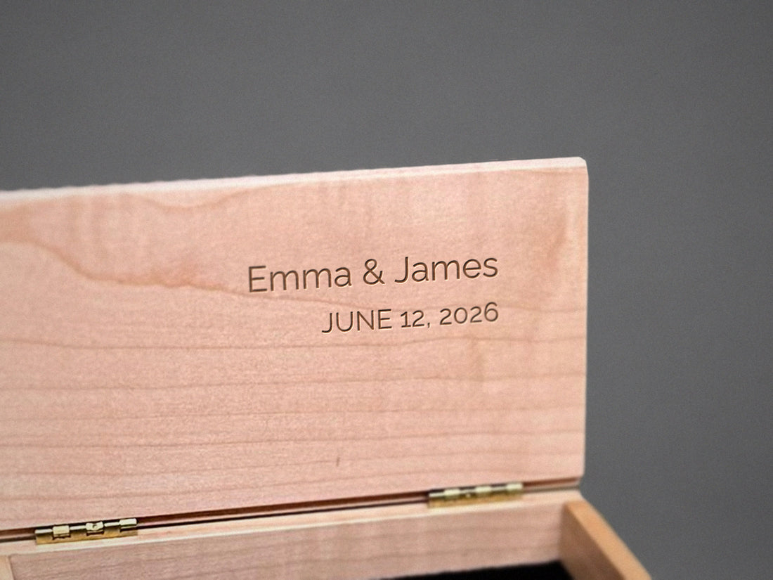 Right-aligned message engraved inside the lid of a curly maple trinket box