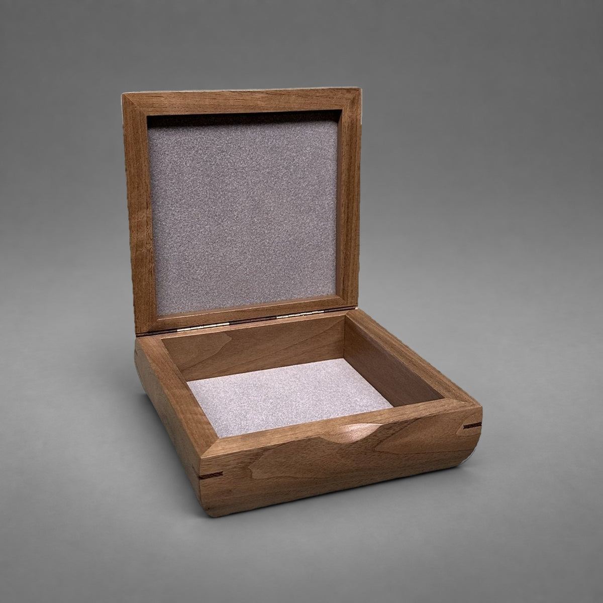 Square Trinket Box in walnut with curly maple lid, open showing soft-lined compartment and lined lid