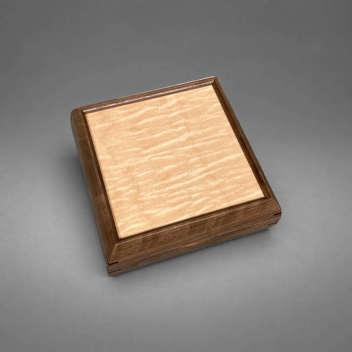 Curly maple lid from above, engraving area