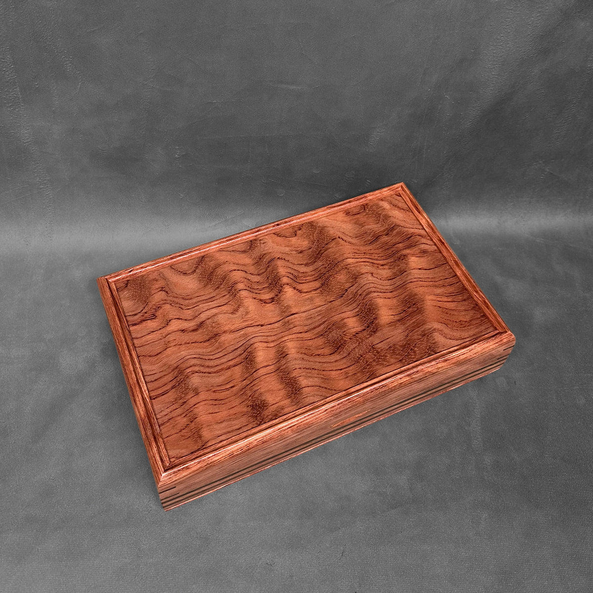The One — October 2026 · Bubinga with Bubinga Lid Wenge Stripes Valet Box